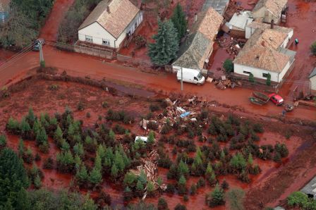 An aerial view of the red mud covered streets and debris scattered in Devecser, Hungary, taken on Tuesday, Oct. 5, 2010. (AP Photo/MTI, Gyoergy Varga)